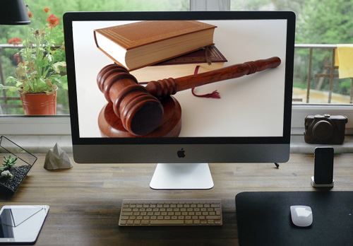 Books and Gavel on Computer Screen